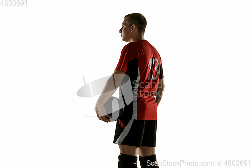 Image of Young caucasian volleyball player placticing isolated on white background