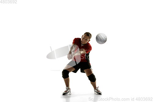 Image of Young caucasian volleyball player placticing isolated on white background