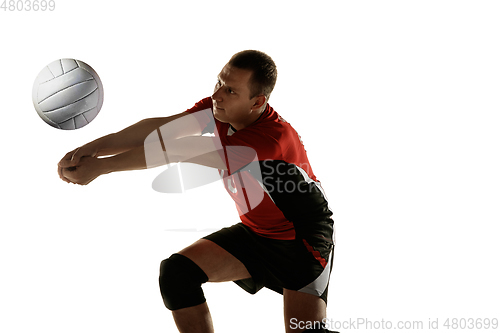 Image of Young caucasian volleyball player placticing isolated on white background