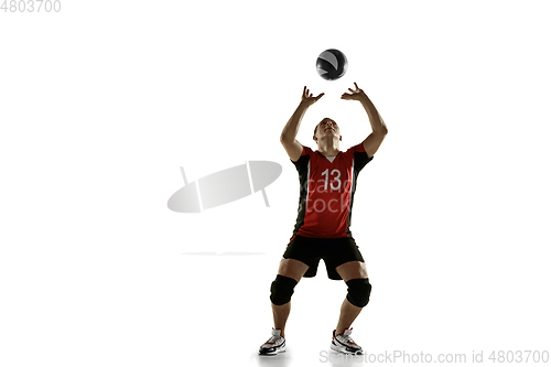 Image of Young caucasian volleyball player placticing isolated on white background