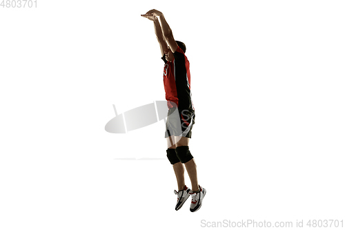 Image of Young caucasian volleyball player placticing isolated on white background