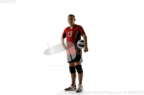 Image of Young caucasian volleyball player placticing isolated on white background