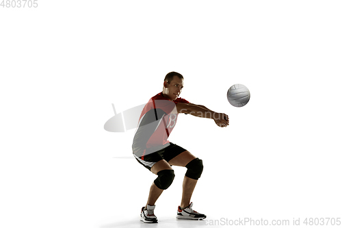 Image of Young caucasian volleyball player placticing isolated on white background