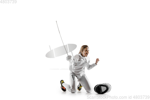 Image of Teen girl in fencing costume with sword in hand isolated on white background