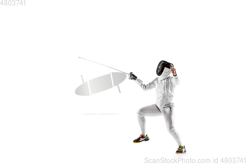 Image of Teen girl in fencing costume with sword in hand isolated on white background