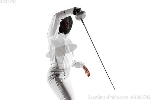 Image of Teen girl in fencing costume with sword in hand isolated on white background