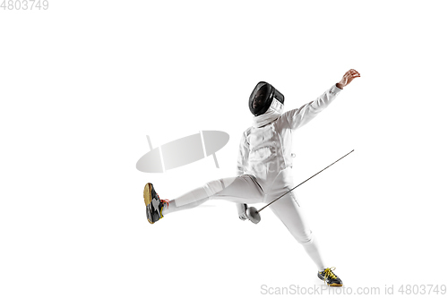 Image of Teen girl in fencing costume with sword in hand isolated on white background