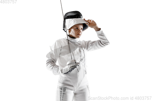 Image of Teen girl in fencing costume with sword in hand isolated on white background