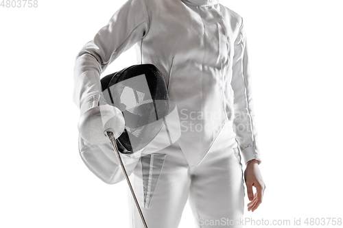 Image of Teen girl in fencing costume with sword in hand isolated on white background