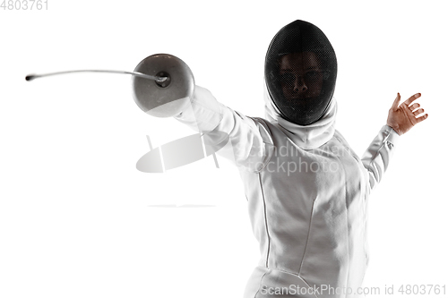 Image of Teen girl in fencing costume with sword in hand isolated on white background