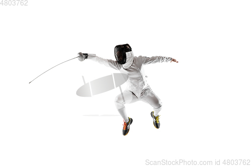 Image of Teen girl in fencing costume with sword in hand isolated on white background