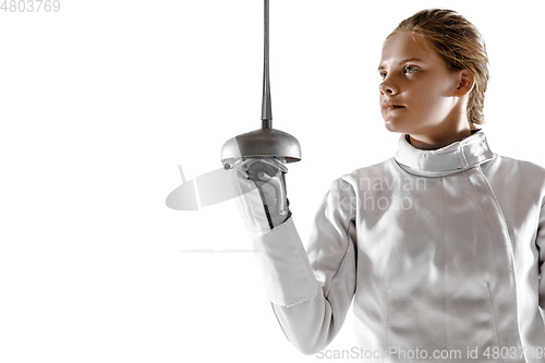 Image of Teen girl in fencing costume with sword in hand isolated on white background