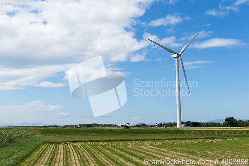 Image of Wind turbine and green field