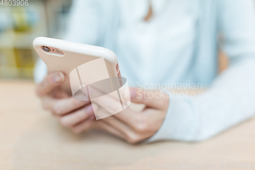 Image of Woman use of cellphone