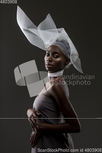 Image of Beautiful african girl with veil hat