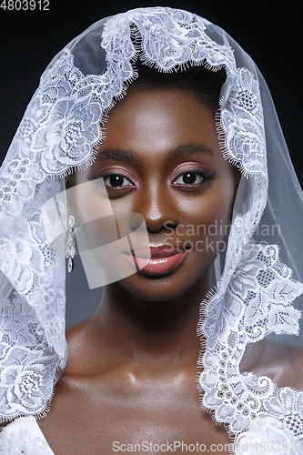 Image of Beautiful african girl with veil hat