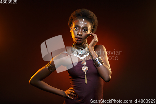 Image of Beautiful afro girl with drawings on skin