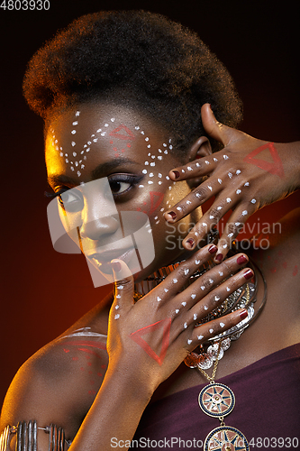 Image of Beautiful afro girl with drawings on skin