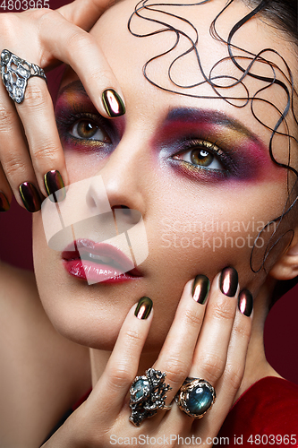 Image of beautiful woman with bright makeup