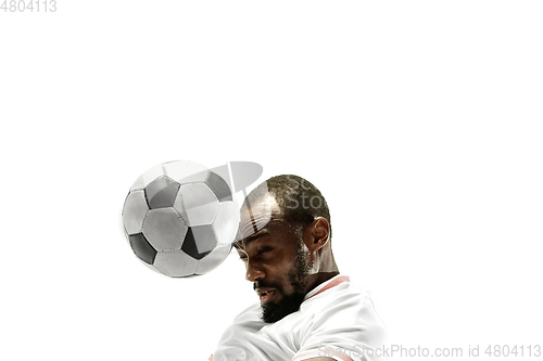 Image of Close up of emotional man playing soccer hitting the ball with the head on isolated white background