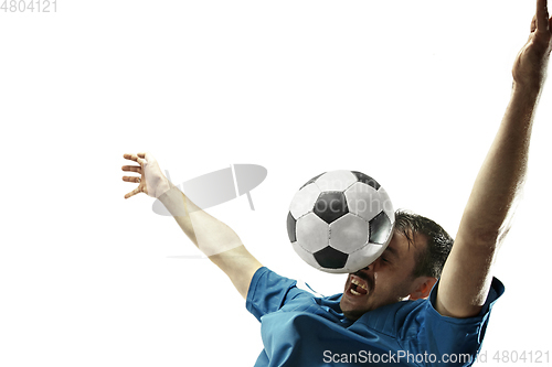 Image of Close up of emotional man playing soccer hitting the ball with the head on isolated white background