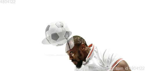 Image of Close up of emotional man playing soccer hitting the ball with the head on isolated white background