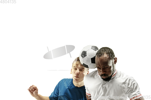 Image of Close up of emotional men playing soccer hitting the ball with the head on isolated on white background
