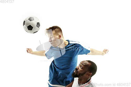 Image of Close up of emotional men playing soccer hitting the ball with the head on isolated on white background