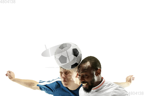 Image of Close up of emotional men playing soccer hitting the ball with the head on isolated on white background