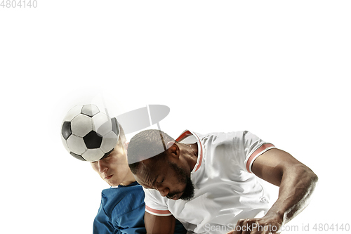 Image of Close up of emotional men playing soccer hitting the ball with the head on isolated on white background