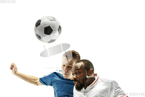 Image of Close up of emotional men playing soccer hitting the ball with the head on isolated on white background