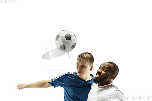 Image of Close up of emotional men playing soccer hitting the ball with the head on isolated on white background