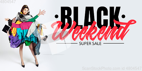 Image of Woman addicted of sales and clothes, black weekend, sales concept