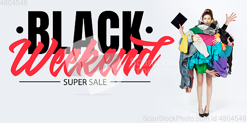 Image of Woman addicted of sales and clothes, black weekend, sales concept