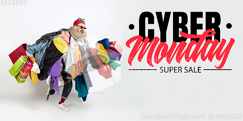 Image of Man addicted of sales and clothes, cyber monday, sales concept