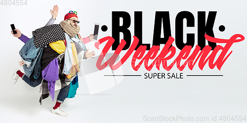 Image of Man addicted of sales and clothes, black weekend, sales concept