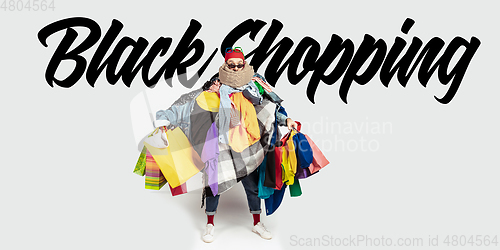 Image of Man addicted of sales and clothes, black shopping, sales concept