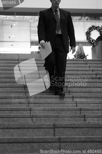 Image of Businessman walking