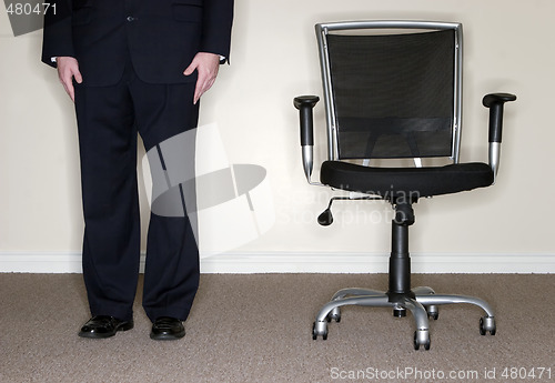 Image of Businessman with Chair