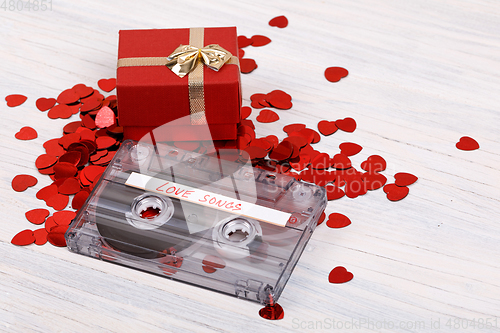 Image of Audio cassette tape and small hearts