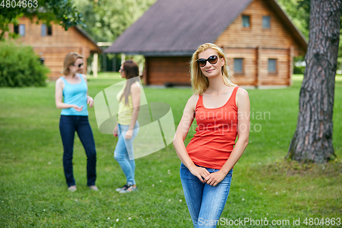 Image of three girls having fun outdoors