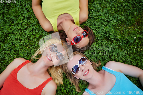 Image of three girls having fun outdoors