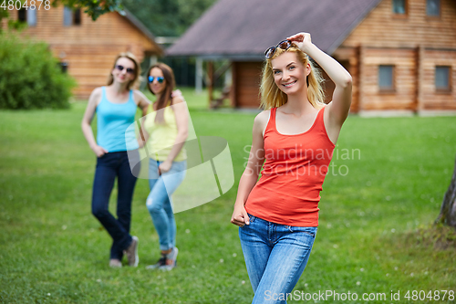 Image of three girls having fun outdoors