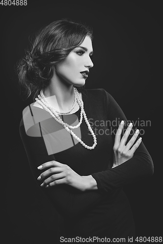 Image of beautiful girl with pearl necklace