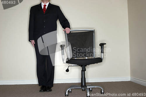 Image of Businessman empty chair