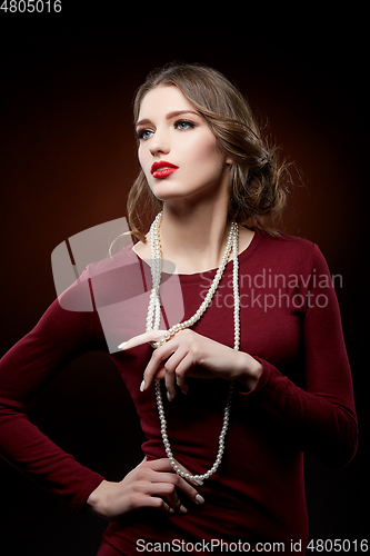 Image of beautiful girl with pearl necklace