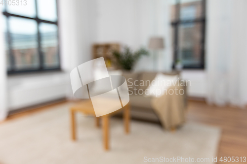 Image of interior of home living room with sofa and table