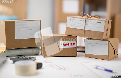 Image of parcel boxes and packing stuff at post office