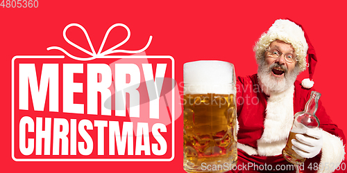 Image of Santa Claus wishing happy New Year and Merry Christmas