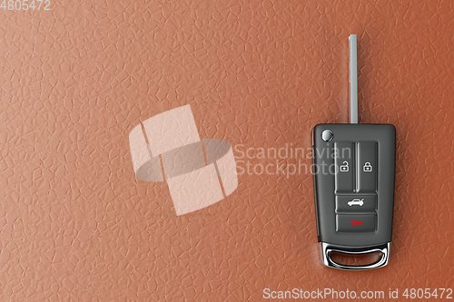 Image of Car key on leather seat